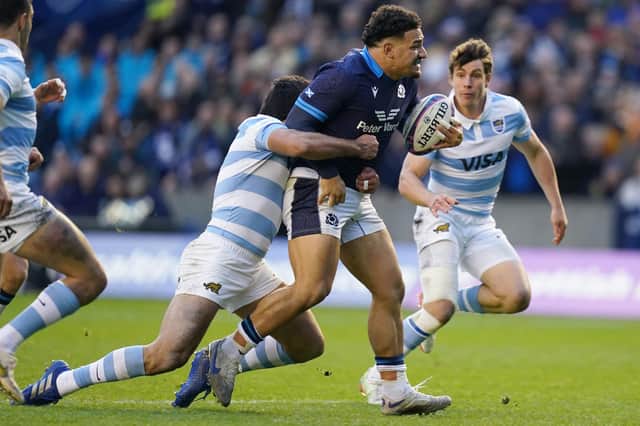 Sione Tuipulotu seems to have work to do but he took his man over the line with him for Scotland's opening try.