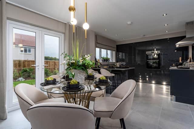 The contemporary open-plan kitchen and dining area in the Avondale