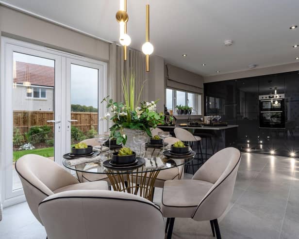 The contemporary open-plan kitchen and dining area in the Avondale