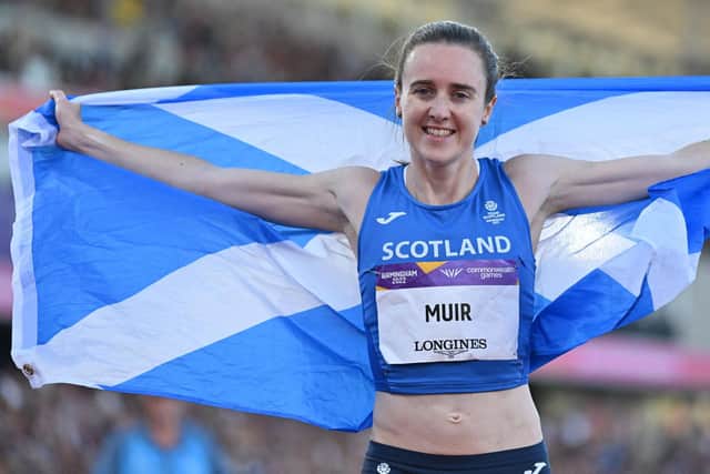 Scotland's Laura Muir celebrates her gold medal in the 1500m final at the Commonwealth Games in Birmingham. (Photo by GLYN KIRK/AFP via Getty Images)