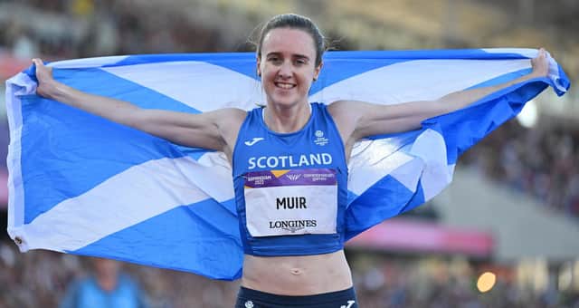 Scotland's Laura Muir celebrates her gold medal in the 1500m final at the Commonwealth Games in Birmingham. (Photo by GLYN KIRK/AFP via Getty Images)