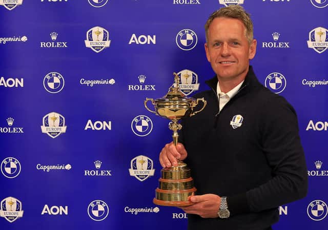 New European Ryder Cup captain Luke Donald poses with the trophy. Picture: Mike Ehrmann/Getty Images.