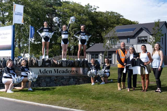 Ellon Academy Cheer Team with Jennifer Martin and Colin Smith from Bancon Homes