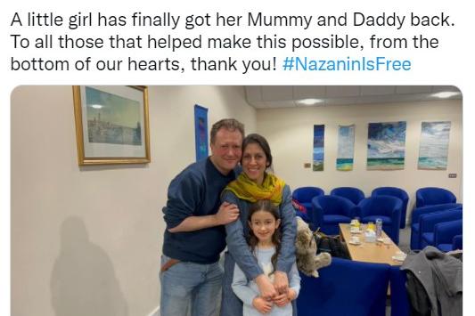 Screen grab from the Twitter feed of Rebecca Ratcliffe @Rebecca_Jones2 of Nazanin Zaghari-Ratcliffe being reunited with her husband Richard Ratcliffe and their daughter Gabrielle at RAF Brize Norton in Oxfordshire.
