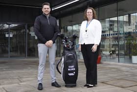 Edinburgh-based professional golfer Stuart McLaren is pictured with Jackie Stone, the St Columba's Hospice CEO, to mark the new partnership.