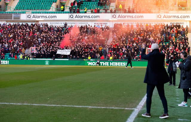 Aberdeen fans make their feelings known about manager Jim Goodwin ahead of the loss to Hibs. (Photo by Paul Devlin / SNS Group)