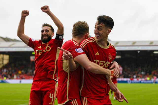 Aberdeen's Bojan Miovski celebrates making it 4-0 against Ross County.