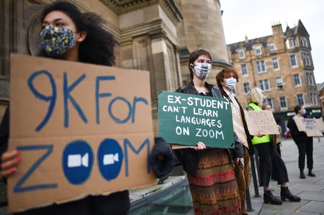 Edinburgh University students protest about the level of online lectures and the failure to deliver 'hybrid learning' amid the coronavirus pandemic. (Photo by Jeff J Mitchell/Getty Images)