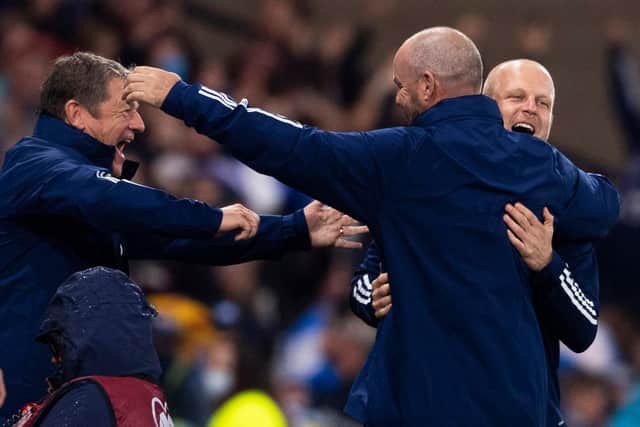Steve Clarke celebrates with assistants John Carver and Steven Naismith at full-time. (Photo by Craig Foy / SNS Group)