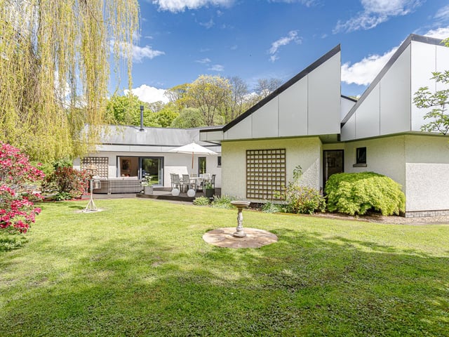 What is it? A unique architect-designed home built in 1982. The four-bedroom property has been substantially upgraded since, and also has a plot with planning permission.