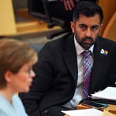 Health secretary Humza Yousaf (right) looks on as Scottish First Minister Nicola Sturgeon speaks. Picture: PA