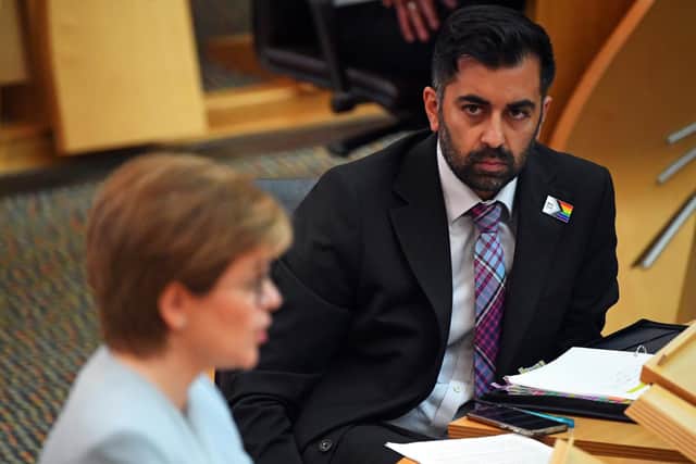 Health secretary Humza Yousaf (right) looks on as Scottish First Minister Nicola Sturgeon speaks. Picture: PA