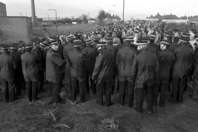 Police keep miners and the NUM picket line back outside Bilston Glen colliery during the miners strike in January 1985.