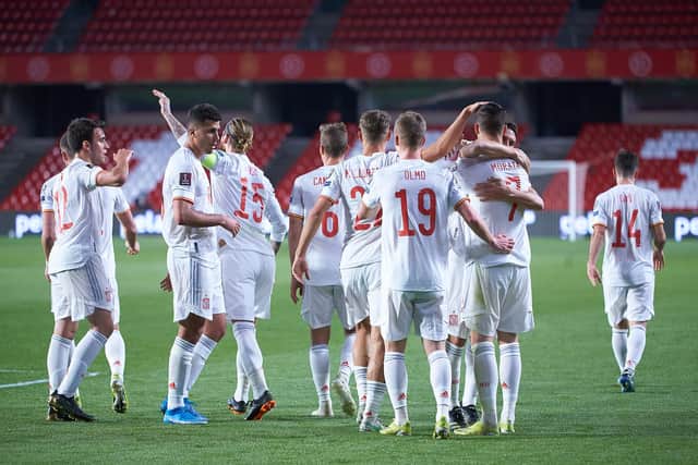 Alvaro Morata of Spain celebrates scoring a goal with team-mates.