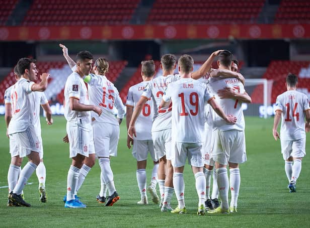 Alvaro Morata of Spain celebrates scoring a goal with team-mates.