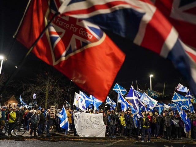 Unionist supporters are seen during a counter demo outside Holyrood, the Scottish Parliament, on November 23, 2022 in Edinburgh, Scotland. Earlier today, the UK Supreme Court judges unanimously rejected the Scottish government's argument that it can hold a second independence referendum. (Photo by Peter Summers/Getty Images)