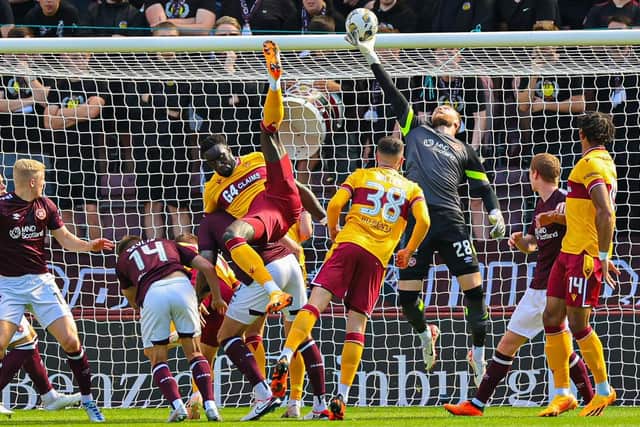Zander Clark makes a save during Hearts' 1-0 defeat by Motherwell.