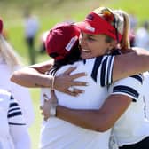 Lexi Thompson hugs US captain Patty Hurst after holing a 25-foot match-winning putt on the second morning of the 17th Solheim Cup in Toledo, Ohio. Picture: Gregory Shamus/Getty Images.