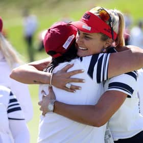 Lexi Thompson hugs US captain Patty Hurst after holing a 25-foot match-winning putt on the second morning of the 17th Solheim Cup in Toledo, Ohio. Picture: Gregory Shamus/Getty Images.