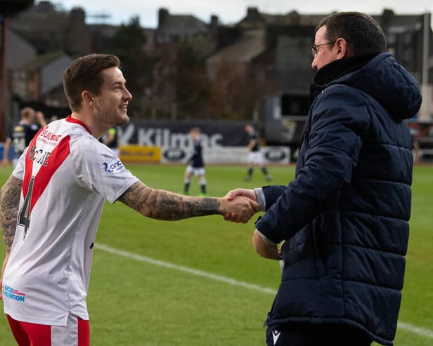 Airdrie player-manager Rhys McCabe and Dundee manager Gary Bowyer during a Scottish Cup third round match.