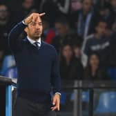 Rangers manager Giovanni van Bronckhorst on the touchline during the 3-0 defeat to Napoli at the Diego Armando Maradona Stadium. (Photo by ANDREAS SOLARO/AFP via Getty Images)