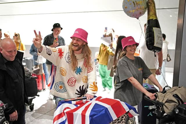 Sam Ryder, arrives at Heathrow Airport in London after finishing second in the final of the Eurovision Song Contest in Italy. Photo: Dominic Lipinski/PA Wire.