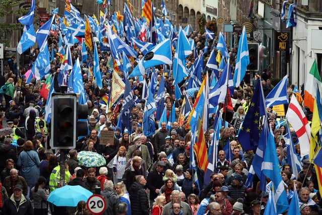 Scottish independence supporters march through Edinburgh during an All Under One Banner march. Picture: Andrew Milligan/PA Wire