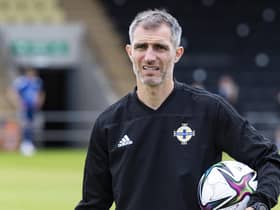 Aaron Hughes has joined Michael O'Neill's Northern Ireland coaching set-up.