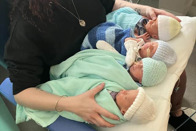 Arlene Mitchell with her four baby boys