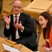 SNP leadership candidate Kate Forbes, applauded by her maternity leave stand-in as finance secretary, John Swinney. Picture: Jeff J Mitchell/Getty Images