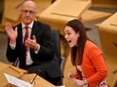 SNP leadership candidate Kate Forbes, applauded by her maternity leave stand-in as finance secretary, John Swinney. Picture: Jeff J Mitchell/Getty Images