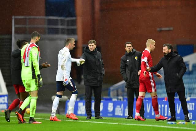 Steven Gerrard salutes Allan McGregor at full time.