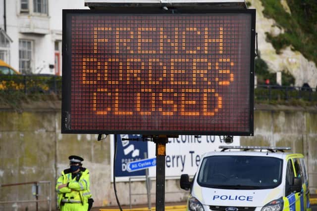 A sign informs drivers that the French border crossing is closed at the cordoned entrance to the ferry terminal at the Port of Dover in Kent, south east England after France closed its borders to accompanied freight arriving from the UK due to the rapid spread of a new coronavirus strain (Photo: JUSTIN TALLIS/AFP via Getty Images)
