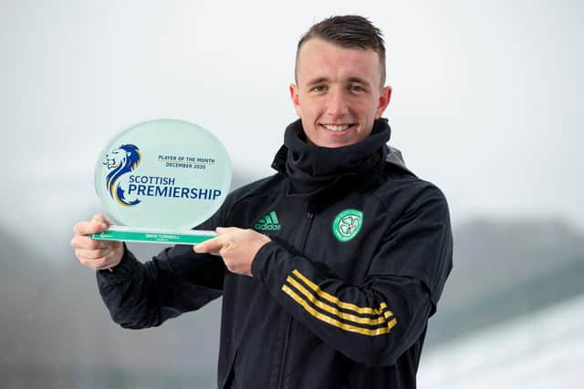 Celtic's David Turnbull is presented with December Scottish Premiership player of the month award at Lennoxtown yesterday. (Photo by Craig Williamson / SNS Group)