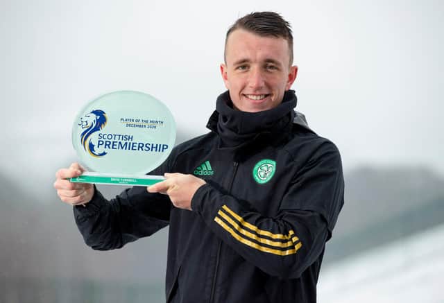 Celtic's David Turnbull is presented with December Scottish Premiership player of the month award at Lennoxtown yesterday. (Photo by Craig Williamson / SNS Group)