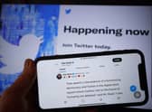 The Twitter social media app displaying a tweet by Elon Musk on a mobile phone, as Elon Musk has said verified accounts on Twitter which change their name to impersonate others will be permanently banned from the site. Picture: Yui Mok/PA Wire