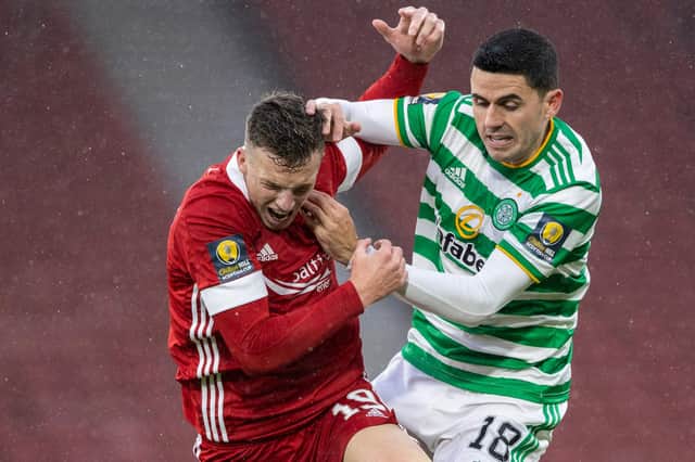 Celtic's Tom Rogic, battling here with  Aberdeen's Lewis Ferguson (left) played a pivotal role as his club booked a Scottish Cup final confrontation with Hearts (Photo by Craig Williamson/SNS Group)