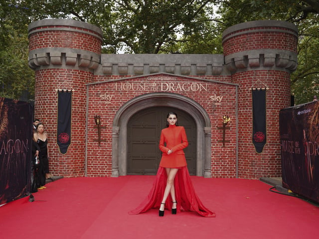 Emily Carey, who plays a young Alicent Hightower, poses for photographers upon arrival for the premiere of House of the Dragon (Photo by Scott Garfitt/Invision/AP)