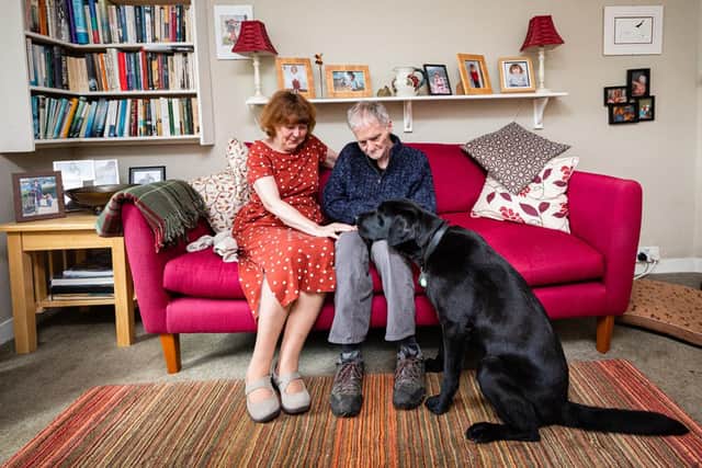 Jon and Jeanette King with dementia dog Lenny. Photo credit should read: Dougie Cunningham/PA Wire