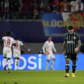 Celtic's Sead Haksabanovic, centre, reacts after Leipzig's Andre Silva scoring his side's third goal during the Champions League Group F match in Germany.