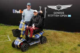 Bob MacIntyre pictured with Scott Stewart, who is suffering from MND, following the Genesis Scottish Open Pro-Am at The Renaissance Club. Picture: Andrew Redington/Getty Images.