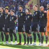 GLASGOW, SCOTLAND - JUNE 01: The Scotland squad during the national anthem during a FIFA World Cup Play-Off Semi Final between Scotland and Ukraine at Hampden Park, on June  01, 2022, in Glasgow, Scotland. (Photo by Craig Foy / SNS Group)