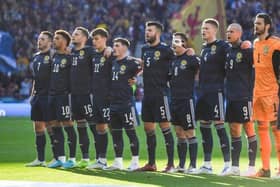 GLASGOW, SCOTLAND - JUNE 01: The Scotland squad during the national anthem during a FIFA World Cup Play-Off Semi Final between Scotland and Ukraine at Hampden Park, on June  01, 2022, in Glasgow, Scotland. (Photo by Craig Foy / SNS Group)