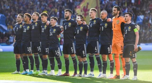 GLASGOW, SCOTLAND - JUNE 01: The Scotland squad during the national anthem during a FIFA World Cup Play-Off Semi Final between Scotland and Ukraine at Hampden Park, on June 01, 2022, in Glasgow, Scotland. (Photo by Craig Foy / SNS Group)