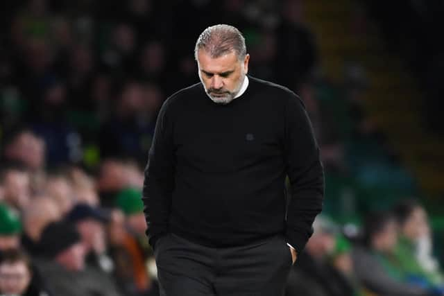 Celtic manager Ange Postecoglou cuts a solemn figure at full-time after the 1-1 draw with Shakhtar Donetsk which ended Celtic's European hopes. (Photo by Ross MacDonald / SNS Group)