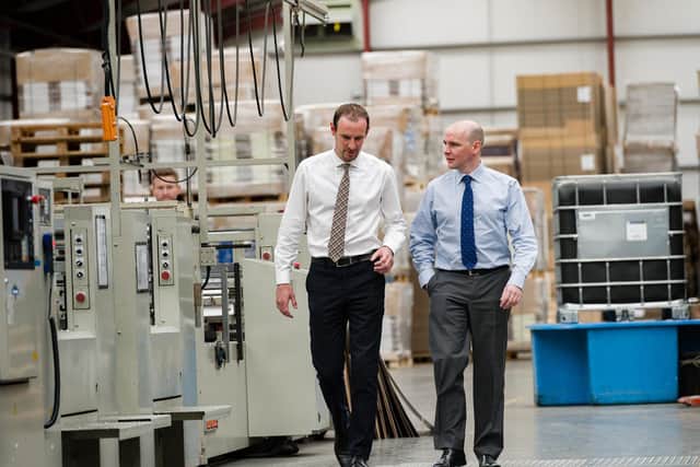 From left: McLaren Packaging directors and brothers Michael and Donald McLaren - the firm is eyeing further growth and reinvestment. Picture: Paul Hampton.