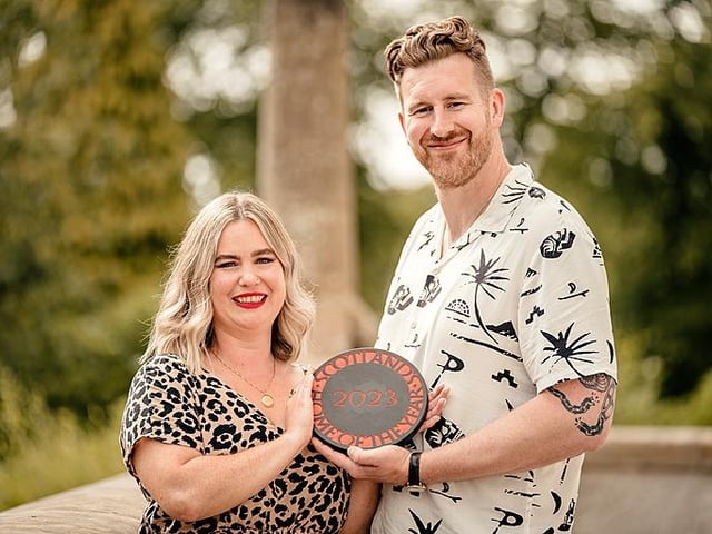 Christina and Ben with their trophy, which was presented at Glasgow's House For An Art Lover.