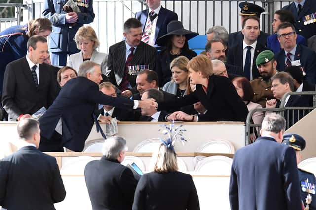 Tony Blair and Nicola Sturgeon shake hands at the dedication service of the Iraq and Afghanistan memorial at Horse Guards Parade in London in 2017 (Picture: Stuart C Wilson/Getty Images)