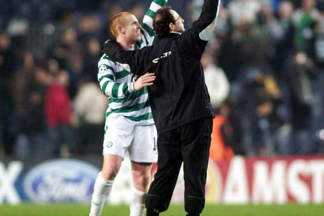 Manager Martin O'Neill (right) and Neil Lennon salute the Celtic fans after their unexpected  Champions League group stage draw at the Nou Camp in November 2004 - O'Neill the only Celtic manager who has enjoyed success in Spain, even without any actual game wins. (Photo by Alan Harvey/SNS Group).