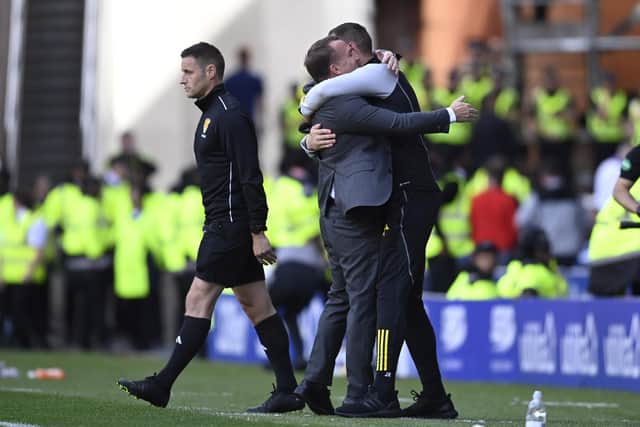 Celtic manager Brendan Rodgers celebrates at full time with assistant John Kennedy after the 1-0 win over Rangers at Ibrox. (Photo by Rob Casey / SNS Group)